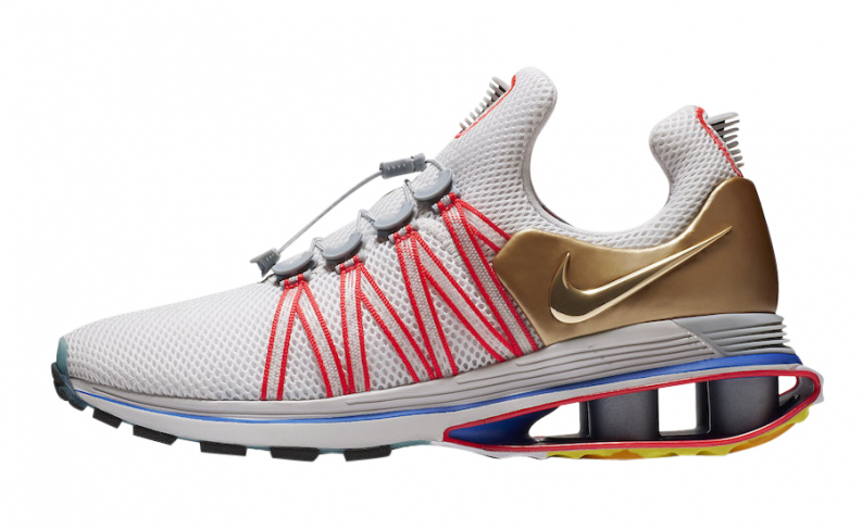 nike shox gravity women's gold